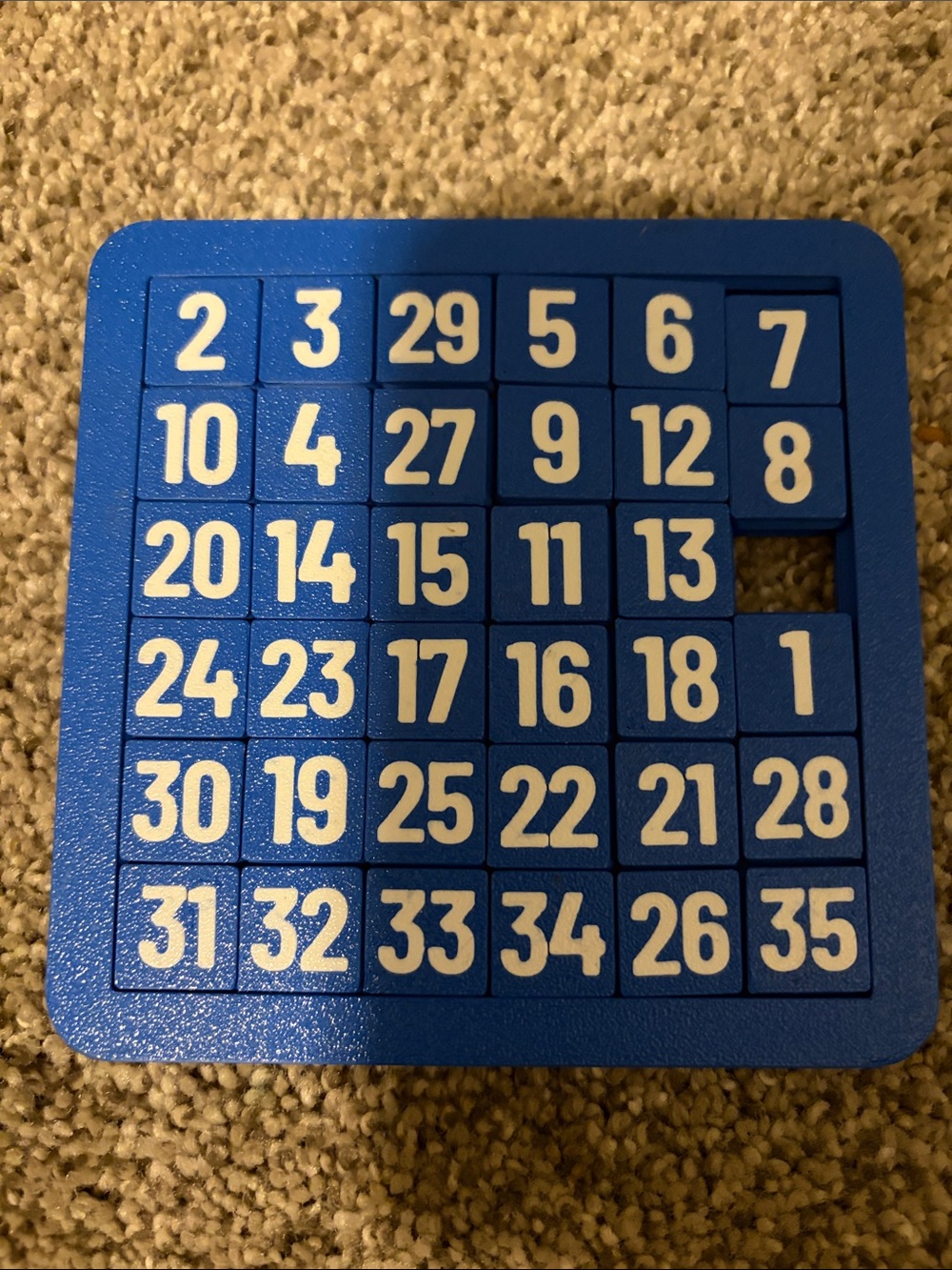 Source Unknown Blue Sliding Number Puzzle Game